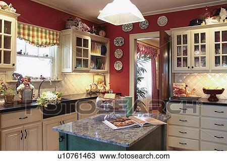 Stock Image - Traditional kitchen with red walls. Fotosearch