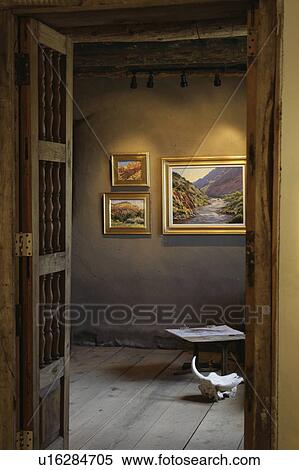 Stock Photography - View through doorway into art gallery. Fotosearch