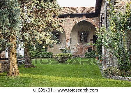 Yard beside old historic Italian castle View Large Photo Image Stock Image - Yard beside old historic Italian castle. Fotosearch