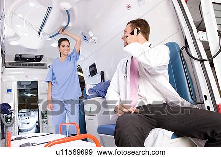 Stock Photo - A doctor and nurse. Fotosearch