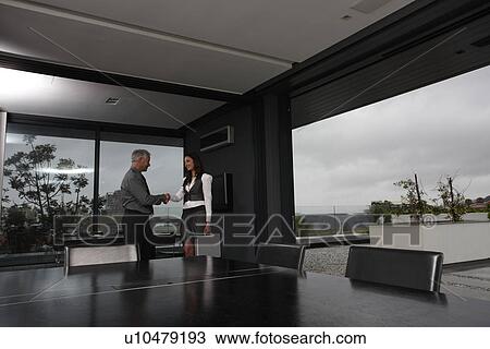 Stock Image - A handshake. Fotosearch