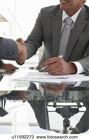 Stock Image - A handshake. Fotosearch