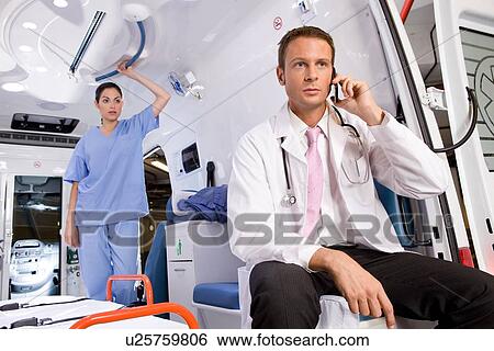 Stock Photograph - A team of paramedics. Fotosearch