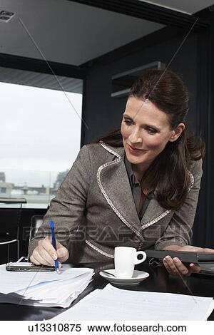 Stock Photography - Accountant at work. Fotosearch