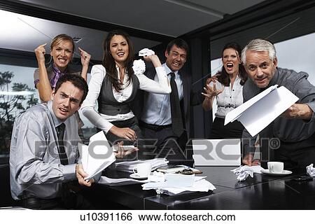 Stock Photograph - Aggressive business team. Fotosearch