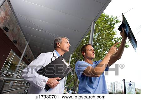 Analyzing an x-ray View Large Photo Image Stock Image - Analyzing an x-ray. Fotosearch