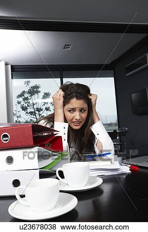 Stock Photo - Anxious business woman. Fotosearch