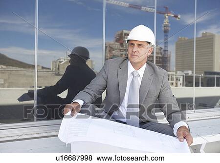 Architect at work View Large Photo Image Stock Photo - Architect at work. Fotosearch