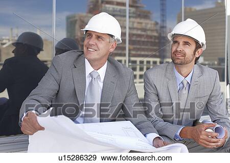 Stock Photo - Architects at a construction site. Fotosearch