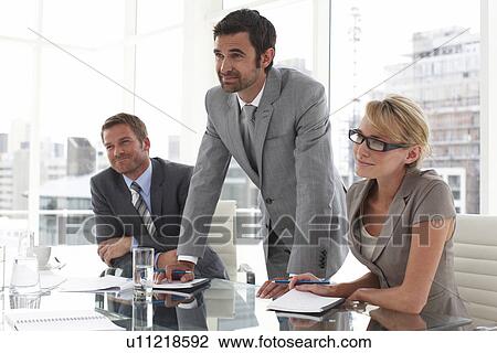 At a business meeting View Large Photo Image Stock Image - At a business meeting. Fotosearch