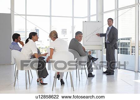 Stock Image - At a presentation. Fotosearch