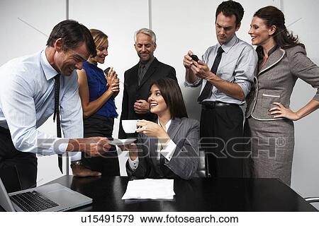 At the office View Large Photo Image Stock Photo - At the office. Fotosearch