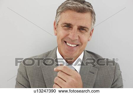 Attractive senior businessman View Large Photo Image Stock Image - Attractive senior businessman. Fotosearch