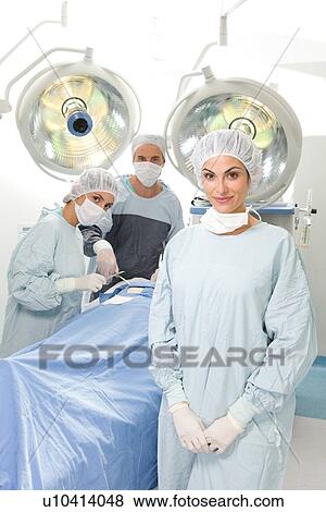 Attractive surgeon View Large Photo Image Stock Photo - Attractive surgeon. Fotosearch