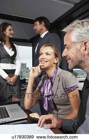 Beautiful business woman smiling View Large Photo Image Stock Photo - Beautiful business woman smiling. Fotosearch