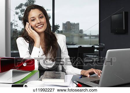 Stock Photo - Beautiful employee. Fotosearch