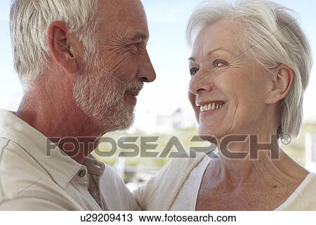 Stock Image - Beautiful mature couple. Fotosearch