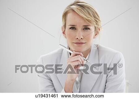 Beautiful woman at work View Large Photo Image Stock Image - Beautiful woman at work. Fotosearch
