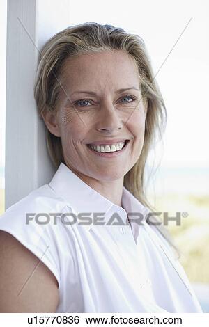 Stock Photograph - Beautiful woman smiling. Fotosearch