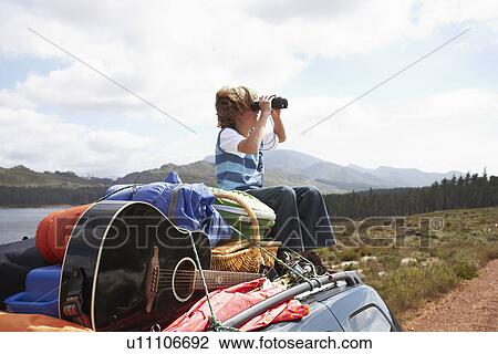 Stock Image - Boy looking for adventures. Fotosearch