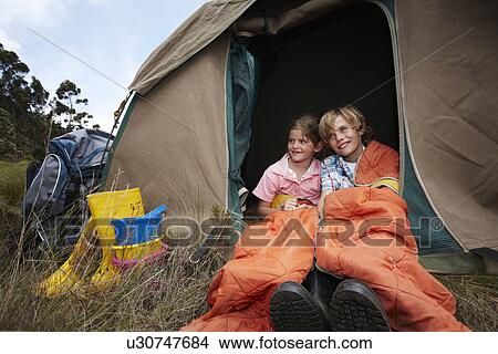 Brother and sister camping View Large Photo Image Picture - Brother and sister camping. Fotosearch