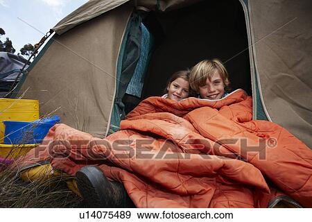 Brother and sister in a tent View Large Photo Image Stock Photo - Brother and sister in a tent. Fotosearch