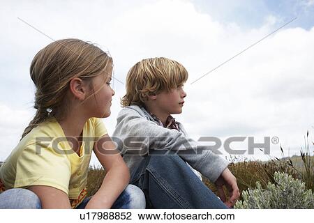 Stock Image - Brother and sister portrait. Fotosearch