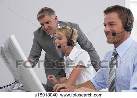 Business owner with his employees View Large Photo Image Stock Image - Business owner with his employees. Fotosearch