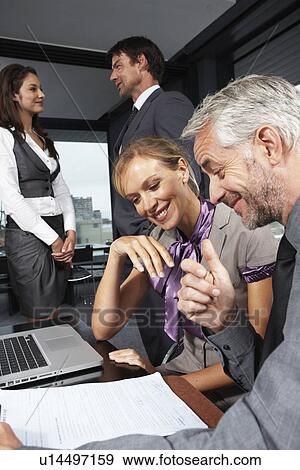 Business people at work View Large Photo Image Stock Photo - Business people at work. Fotosearch