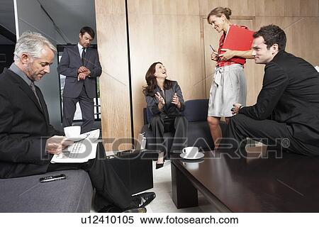 Stock Photography - Business people hanging out. Fotosearch