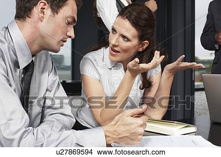 Business people having a conversation View Large Photo Image Picture - Business people having a conversation. Fotosearch