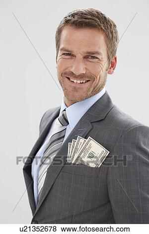 Stock Photo - Businessman with dollar notes. Fotosearch