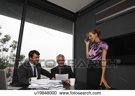 Businesspeople at work View Large Photo Image Stock Image - Businesspeople at work. Fotosearch