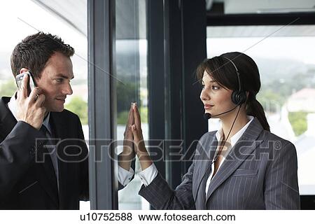 Stock Photo - Businesspeople couple. Fotosearch