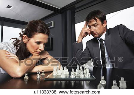 Businesspeople playing chess View Large Photo Image Stock Photo - Businesspeople playing chess. Fotosearch