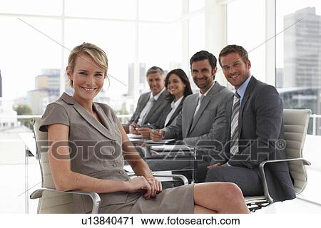 Businesswoman at a meeting View Large Photo Image Stock Image - Businesswoman at a meeting. Fotosearch