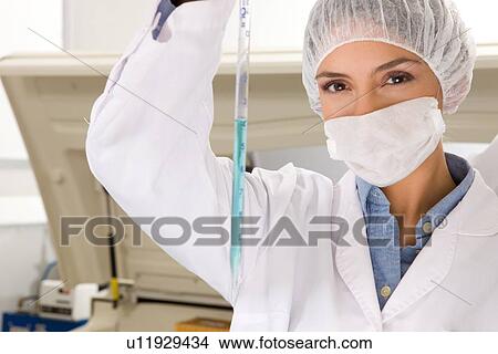 Chemist at work View Large Photo Image Picture - Chemist at work. Fotosearch