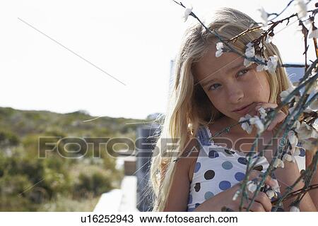 Child with a tree View Large Photo Image Stock Image - Child with a tree. Fotosearch