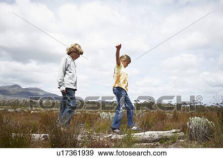 Children playing outdoors View Large Photo Image Stock Photo - Children playing outdoors. Fotosearch