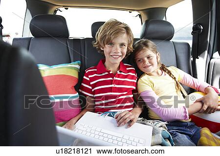 Stock Image - Children with a laptop. Fotosearch