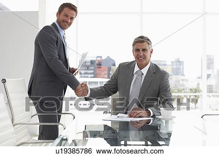 Stock Photograph - Closing a deal. Fotosearch