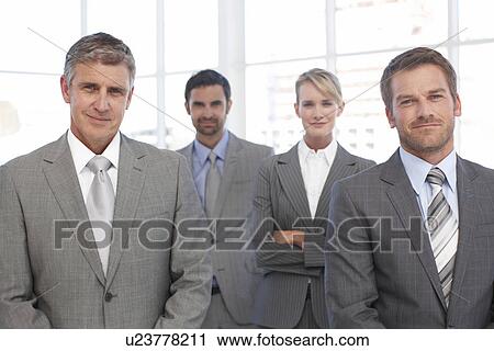 Stock Image - Confident business team. Fotosearch