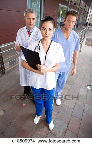 Picture - Confident physicians team. Fotosearch