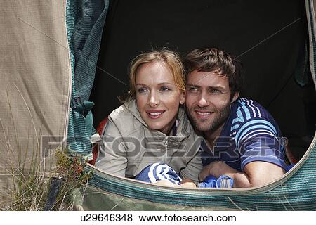 Couple camping View Large Photo Image Stock Photo - Couple camping. Fotosearch
