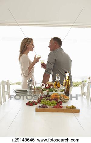 Couple celebrating View Large Photo Image Stock Photograph - Couple celebrating. Fotosearch