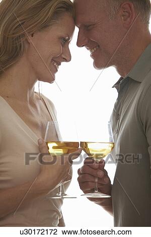 Couple drinking wine View Large Photo Image Stock Image - Couple drinking wine. Fotosearch