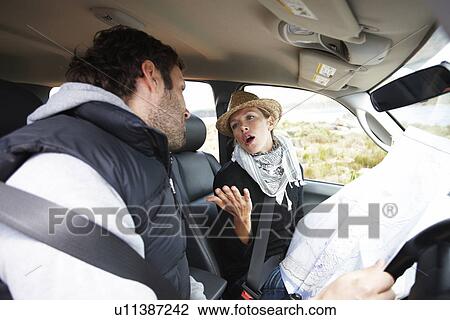 Couple fighting in their car View Large Photo Image Stock Image - Couple fighting in their car. Fotosearch