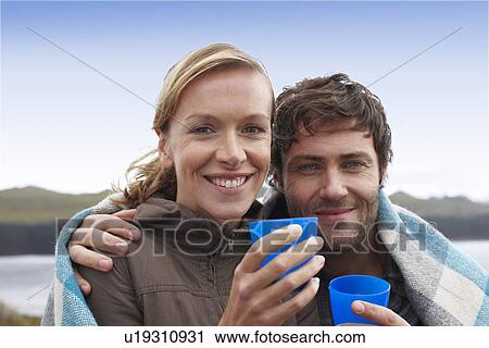 Stock Image - Couple in the countryside. Fotosearch