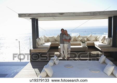Stock Image - Couple in their luxurious house. Fotosearch