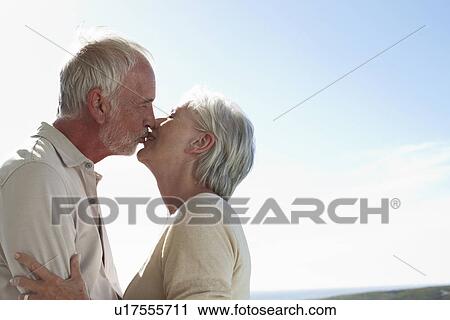 Couple kissing View Large Photo Image Stock Image - Couple kissing. Fotosearch